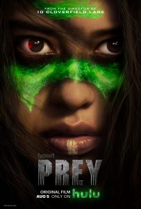 Poster for the movie, Prey. A sequel in the Predator franchise. The image showcases lead actress, Amber Midthunder taking center stage with the Predators green blood on her face. Used for display purposes only. Under the fair use act.