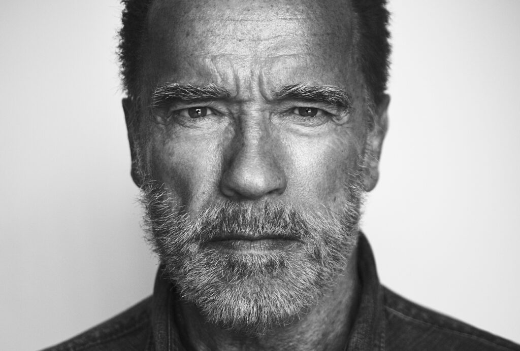 Greyscale photo of Arnold Schwarzenegger