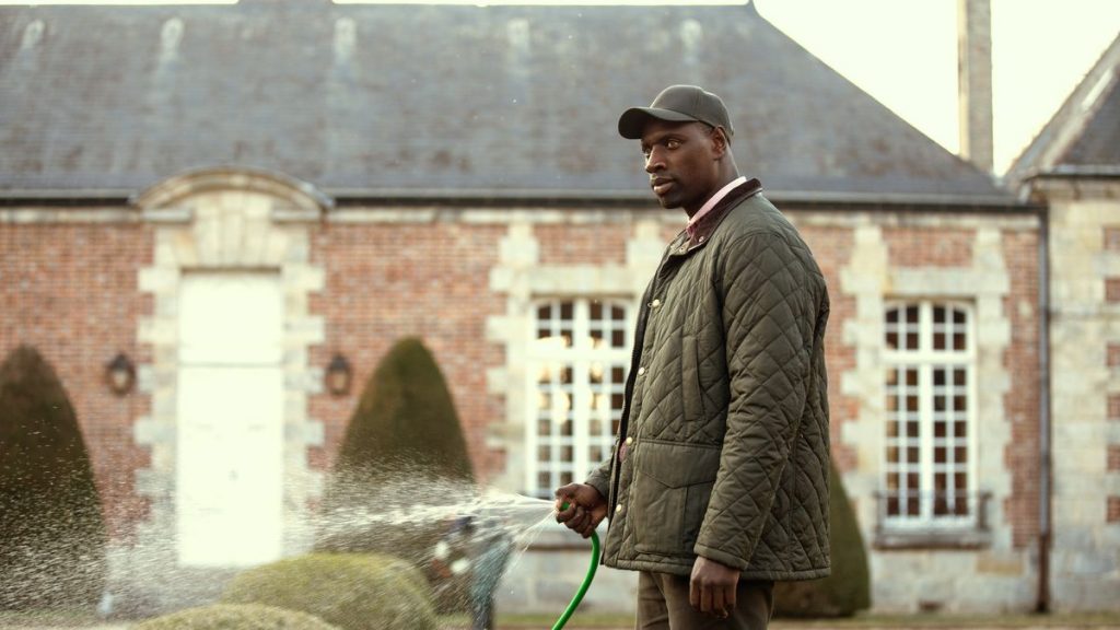 Assane Diop dressed as a gardener to prepare for a heist.